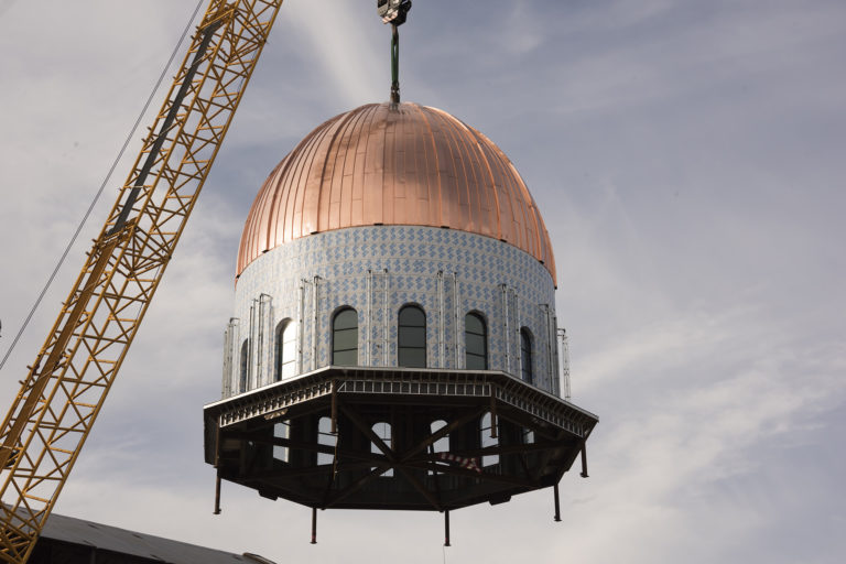 Dome being lifted at catherdral site